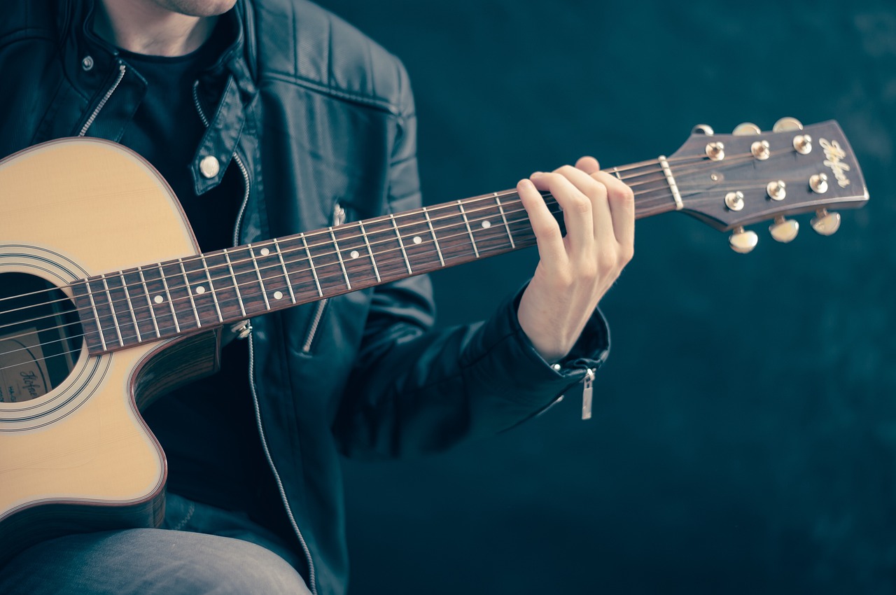 Le guide ultime pour choisir la sangle de guitare parfaite